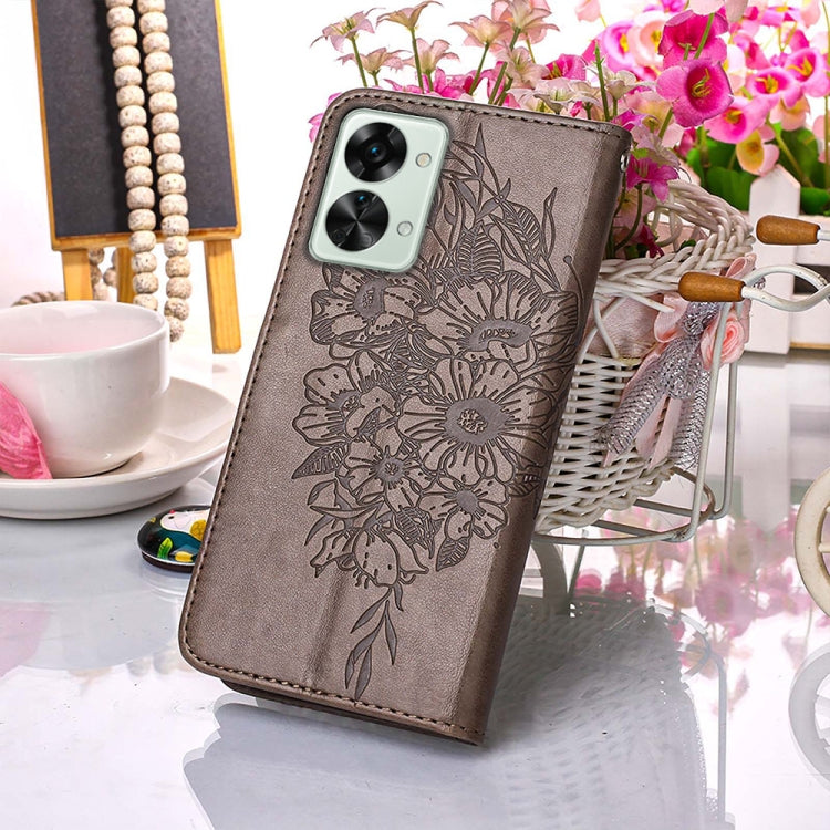 Rose leather phone case with embossed butterfly; folio style with card slots