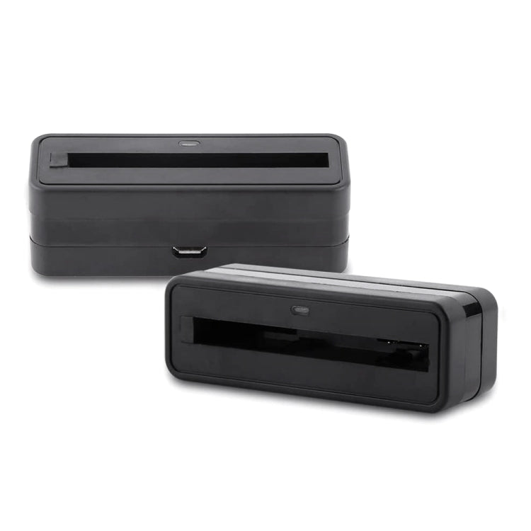 Black USB battery charger adapter with battery slot and side charging port visible