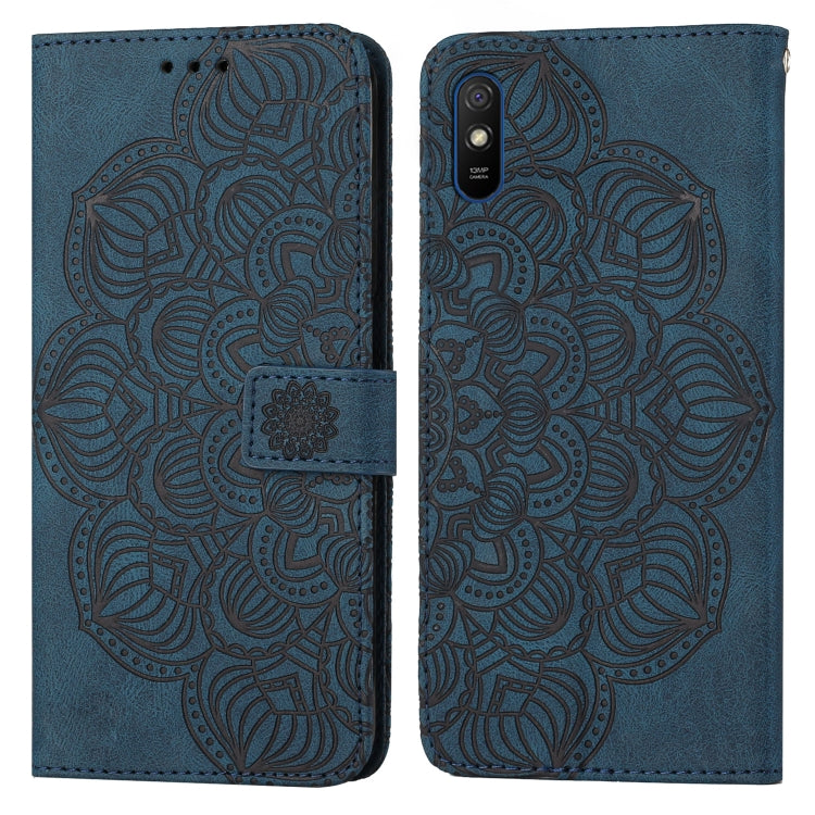 Blue embossed mandala flip phone case with magnetic strap and camera cutout