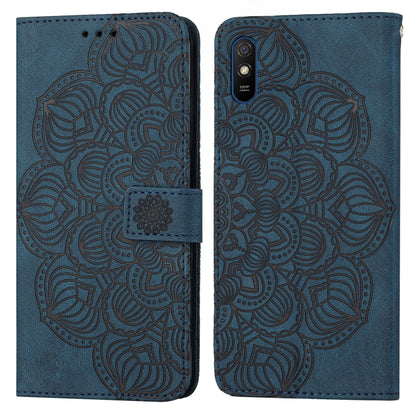 Blue embossed mandala flip phone case with magnetic strap and camera cutout