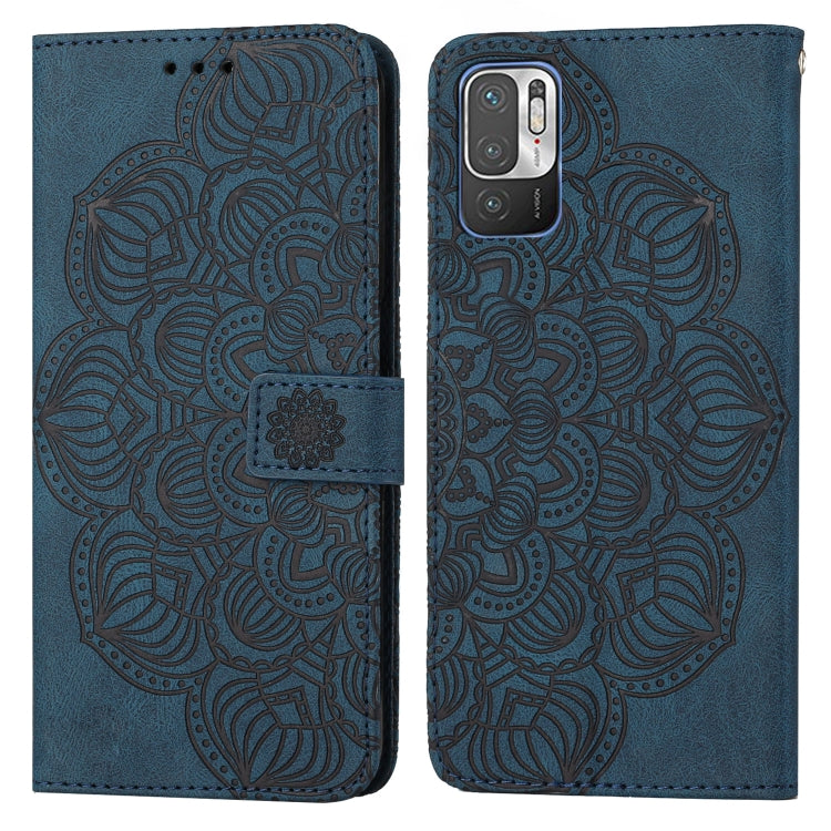 Blue mandala-embossed flip leather phone case with magnetic strap, front-facing camera cutout