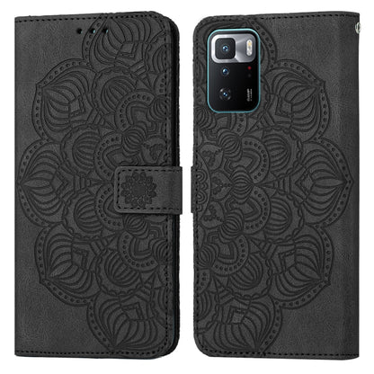 Black embossed mandala flip leather wallet phone case with card slot and magnetic closure.