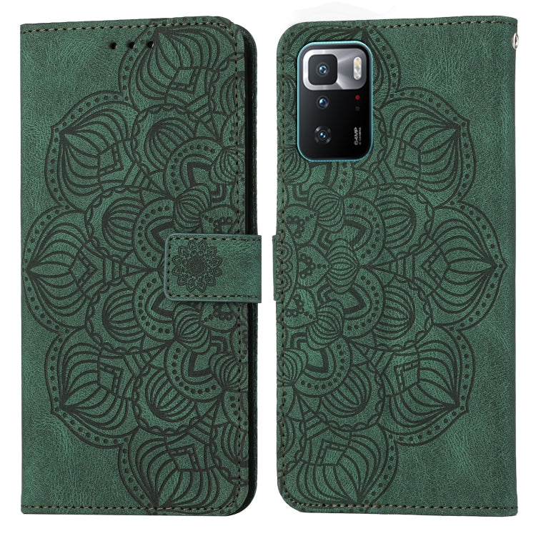 Green embossed mandala flip leather wallet phone case with card slot and magnetic closure.