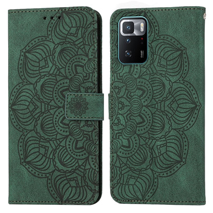 Green embossed mandala flip leather wallet phone case with card slot and magnetic closure.