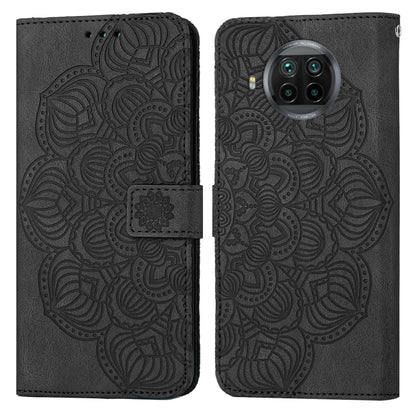 Black mandala embossed flip leather phone case, back view with raised camera area