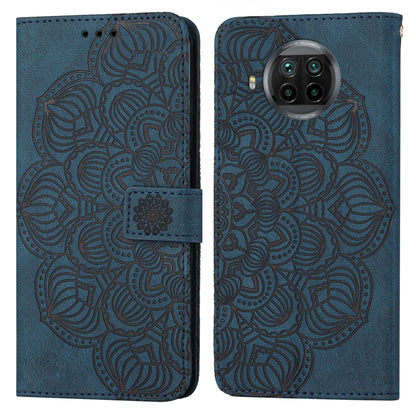 Blue mandala embossed flip leather phone case, back view with raised camera area
