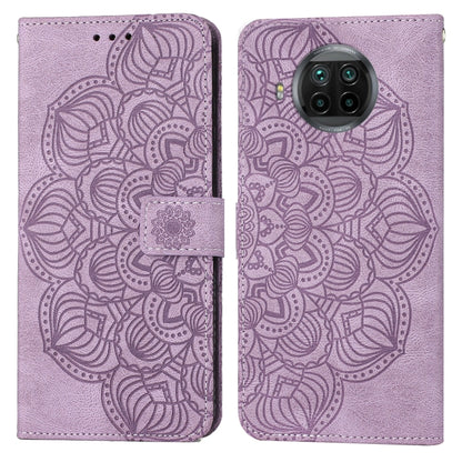 Purple mandala embossed flip leather phone case with front flap and magnetic strap.