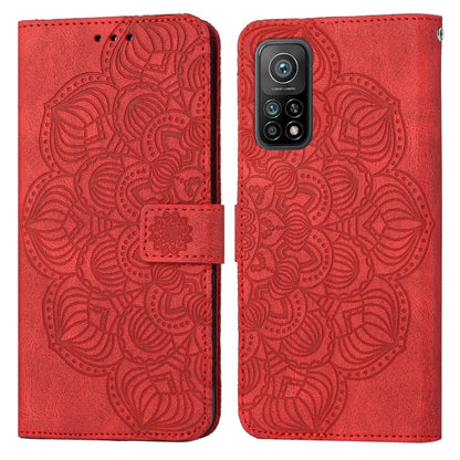 Red mandala embossed flip leather phone case with front flap and magnetic strap.