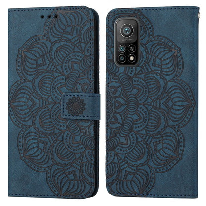 Blue mandala embossed flip leather phone case with front flap and magnetic strap.