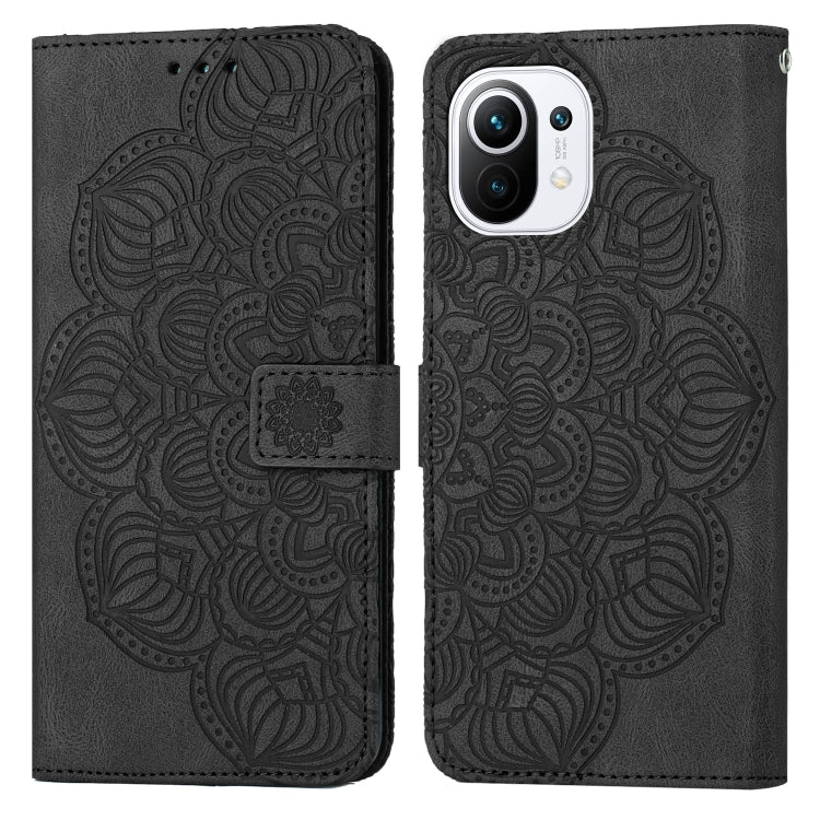 Black mandala embossed flip leather phone case with camera cutout and magnetic strap.