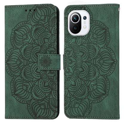 Green mandala embossed flip leather phone case with camera cutout and magnetic strap.
