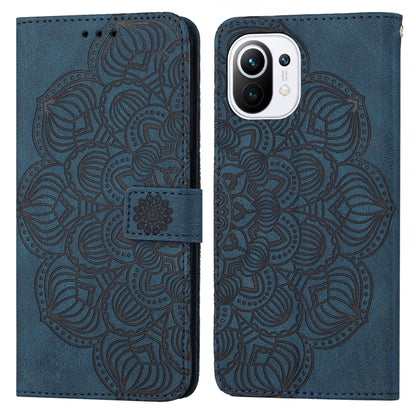 Blue mandala embossed flip leather phone case with camera cutout and magnetic strap.