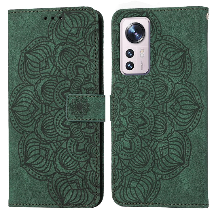 Green embossed mandala flip leather phone case with magnetic strap closure