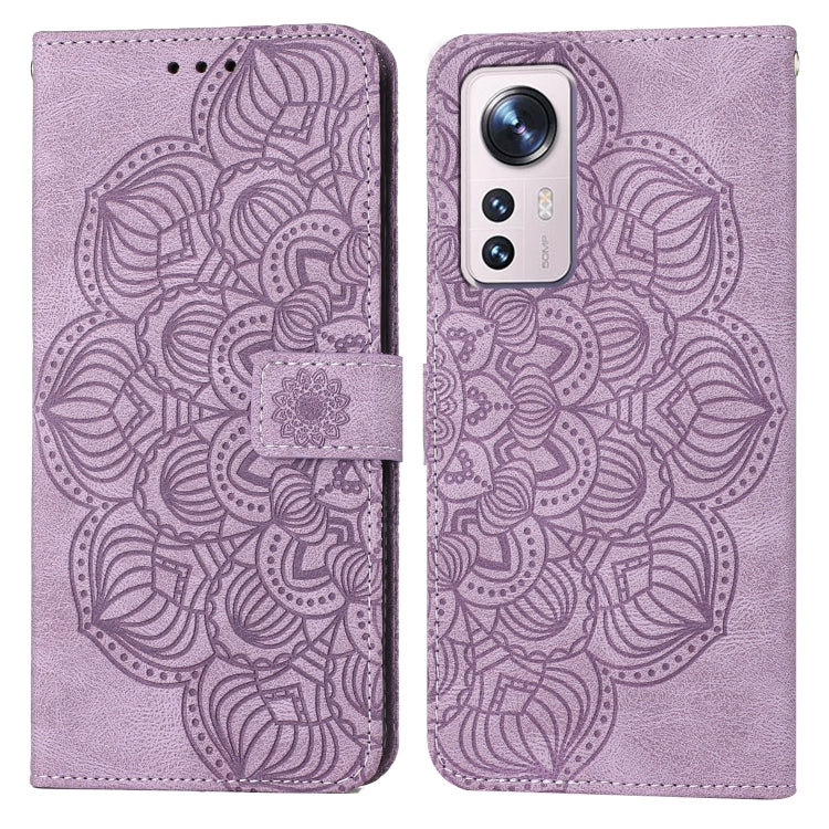 Purple embossed flip leather phone case with mandala pattern and magnetic strap closure.