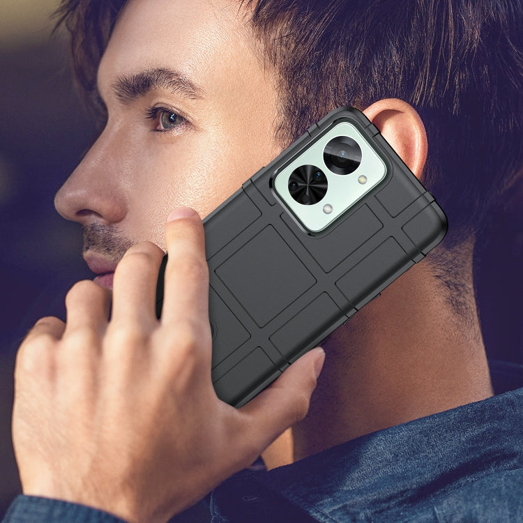 Rugged TPU phone case with textured back and camera cutouts while in use (black)
