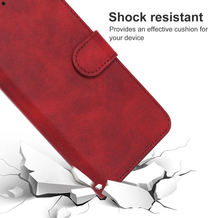 Red leather phone case with flip strap buckle and stitched edges