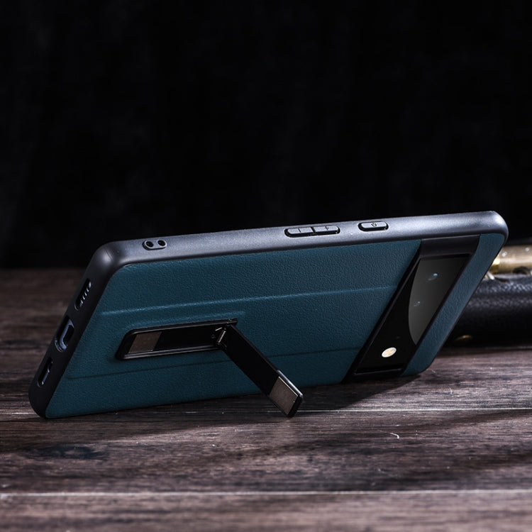 Blue leather-texture protective phone case with metal holder stand detail and port cutouts