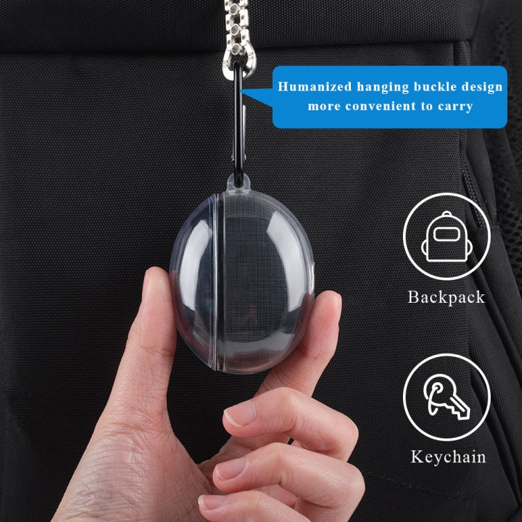 Transparent TPU earbud case with hanging keychain buckle on dark fabric background