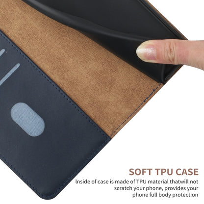 Leather flip phone case close-up: dark blue exterior with tan inner lining
