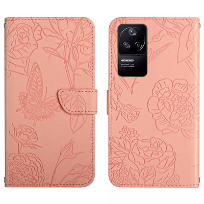 Pink embossed leather phone case with butterfly and floral peony pattern and camera cutout
