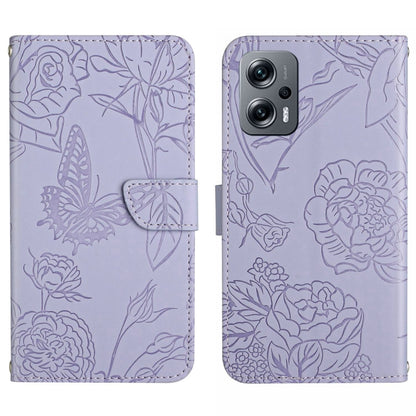 Lavender embossed butterfly-and-flower leather-look phone case with flip cover and camera cutout.