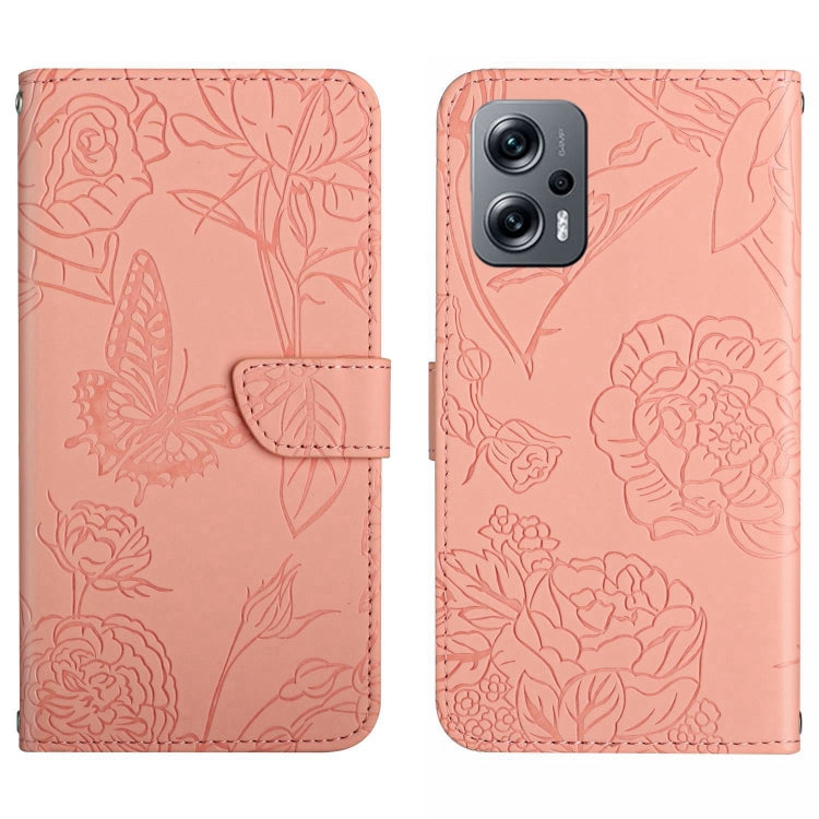 Pink embossed butterfly-and-flower leather-look phone case with flip cover and card slot.