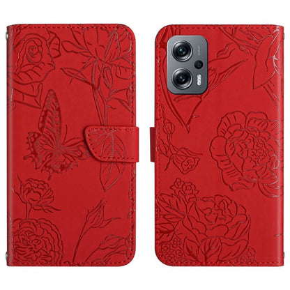 Red embossed butterfly-and-flower phone case back with dual-camera cutout and smooth edges.