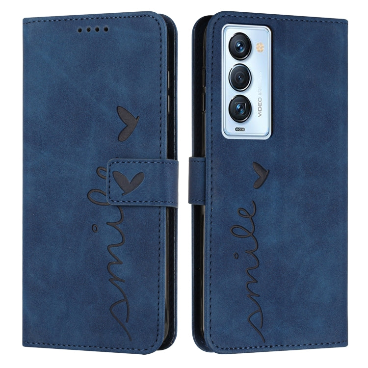 Blue leather wallet phone case with heart-and-bird line art, camera cutout front.