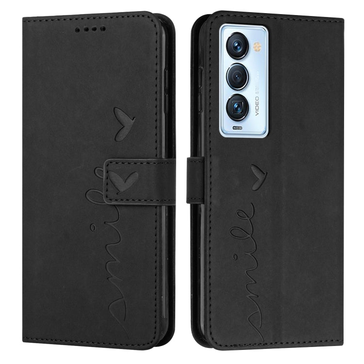 Black leather wallet phone case with heart-and-bird line art, camera cutout front.