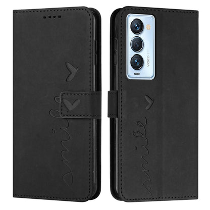 Black leather wallet phone case with heart-and-bird line art, camera cutout front.