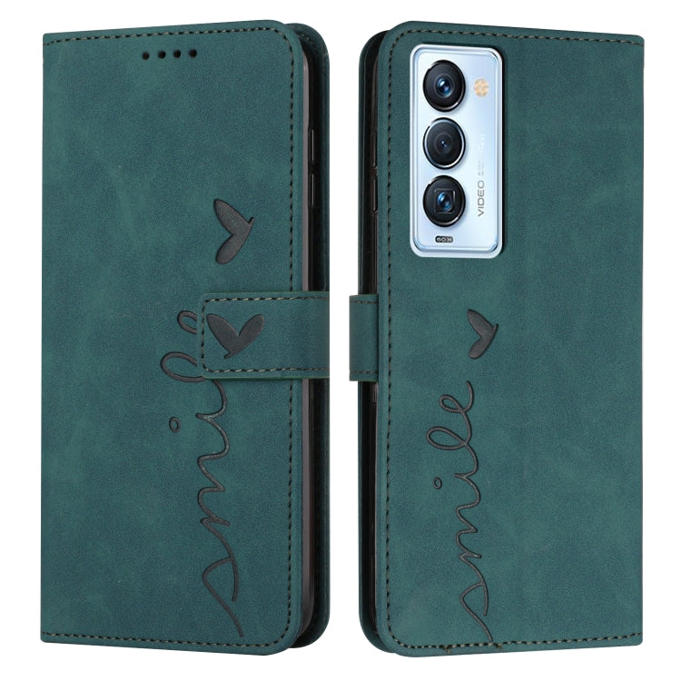 Leather wallet phone case with heart pattern, flap closure, teal/green finish, card slots