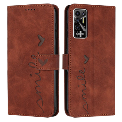 Leather wallet phone case with heart pattern, flap closure, brown finish, camera lens cover