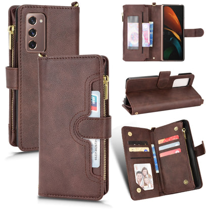 Brown litchi texture zipper leather phone case with card slots and flip-open stand