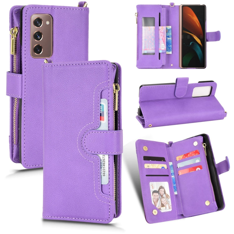 Purple litchi texture zipper leather phone case with card slots and flip-open stand