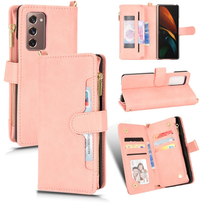 Pink litchi-texture leather phone case wallet with zipper and card slots, flap cover.