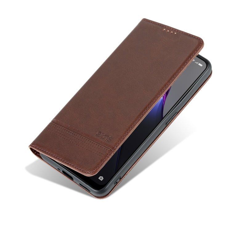 Dark brown magnetic flip phone case folded flat, showing smooth leather front panel.