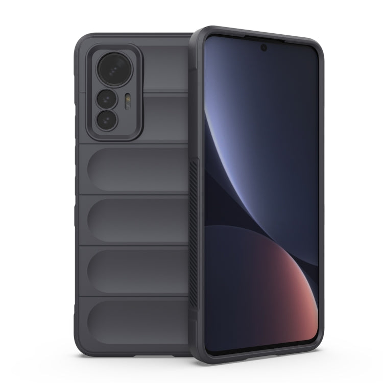 Dark gray TPU phone case with ridged panel design and triple camera cutouts