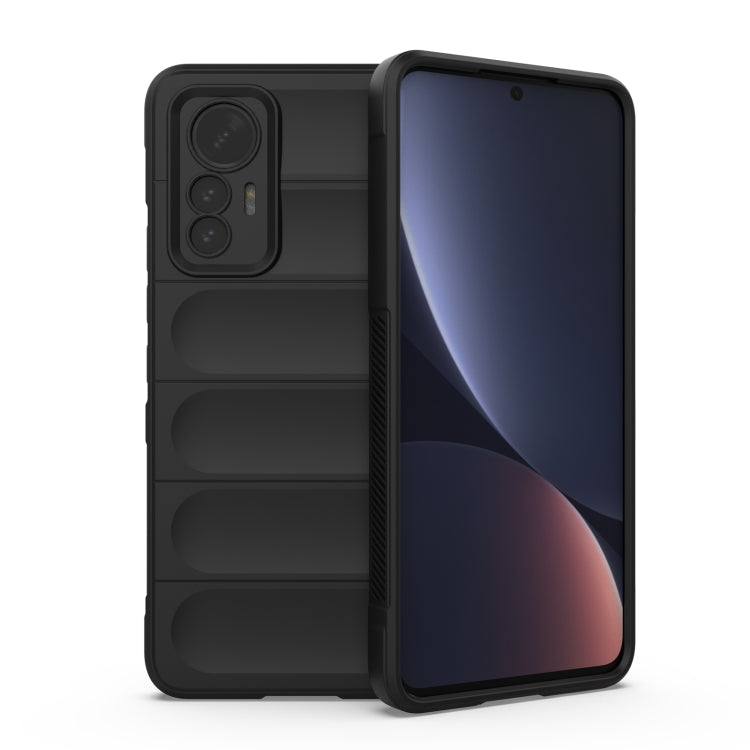 Black TPU phone case with ridged panel design and triple camera cutouts