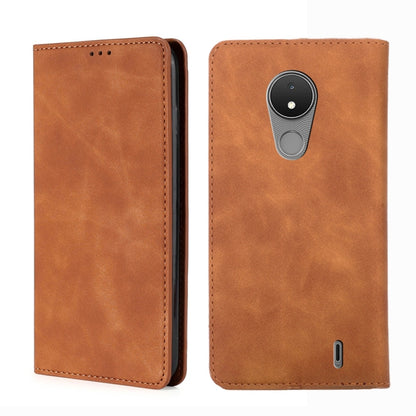 Leather magnetic flip phone case in light brown, with cutouts and stitched edges.