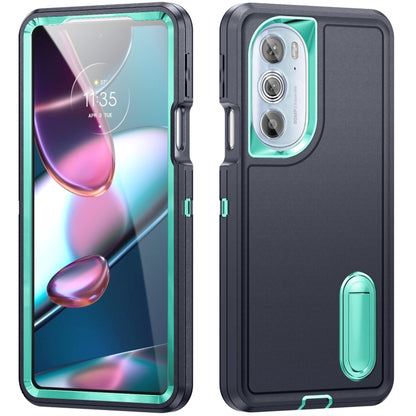 Rugged phone case in dark blue/black with teal accent, front and back views