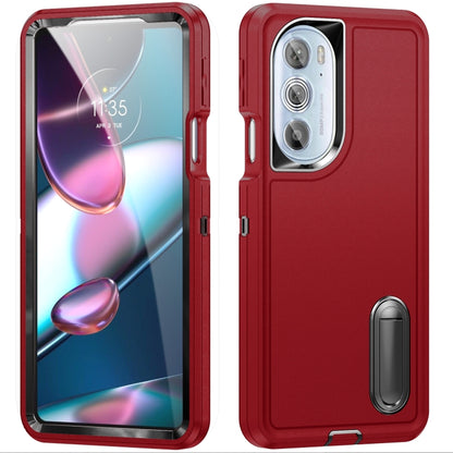Rugged phone case with transparent front, red border, camera cutout and built-in stand