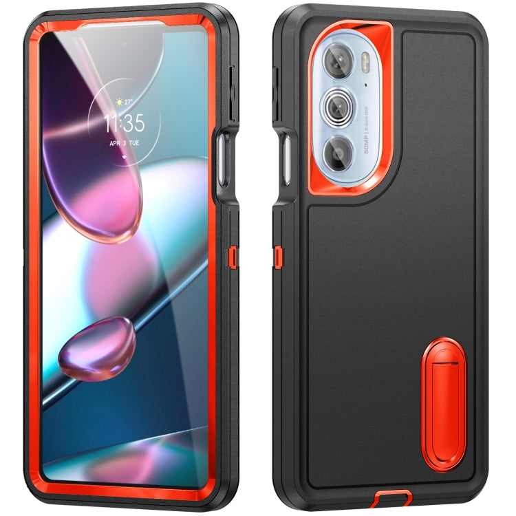 Rugged phone case with orange accents, camera cutout and built-in stand