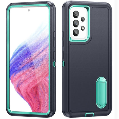 Rugged phone case in dark gray with teal accents, camera cutout and built-in stand
