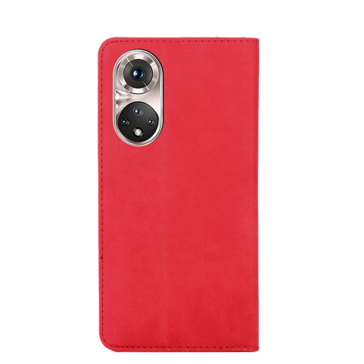 Magnetic flip leather phone case in red with camera cutout and reinforced stitching.