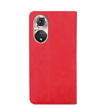 Magnetic flip leather phone case in red with camera cutout and reinforced stitching.