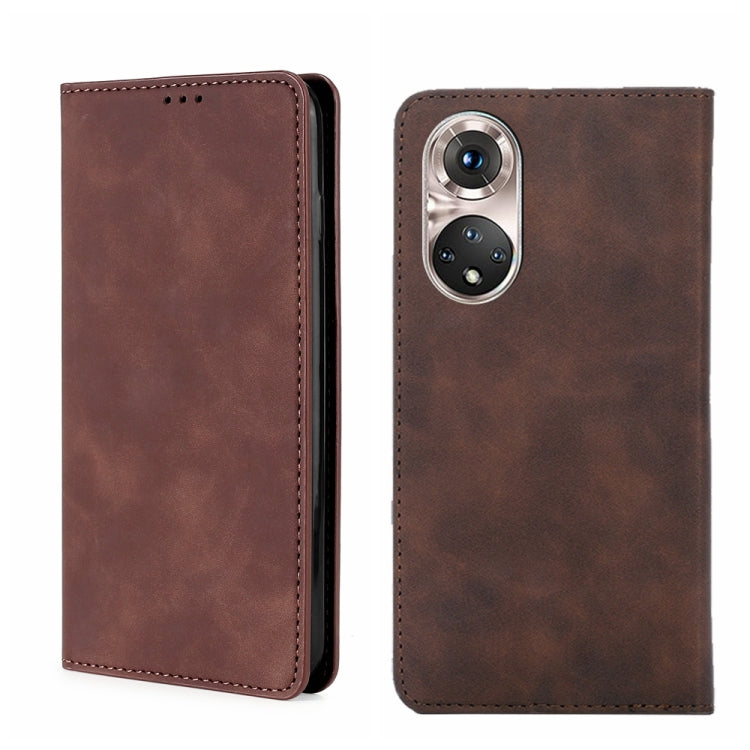 Magnetic flip leather phone case in dark brown with camera cutout and stitched trim.