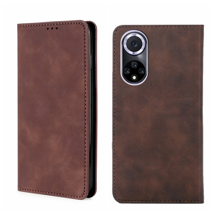 Magnetic flip leather phone case, dark brown with camera cutout and stitched edges.
