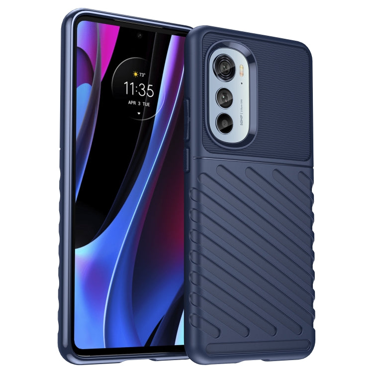 Shockproof TPU phone case, blue textured grip with camera cutouts and raised edges