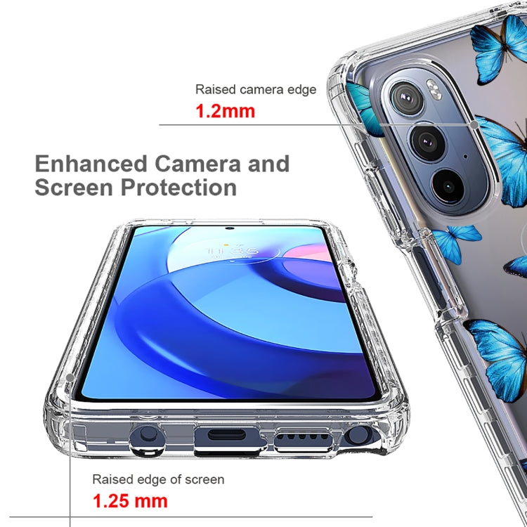 Transparent phone case with raised camera edge and blue butterfly print.