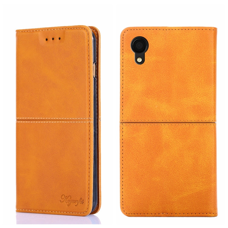Orange cow-texture magnetic flip leather phone case, back view with camera opening and stitching.